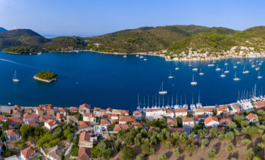 Adventurers discovering natural wonders and caves in Greece.