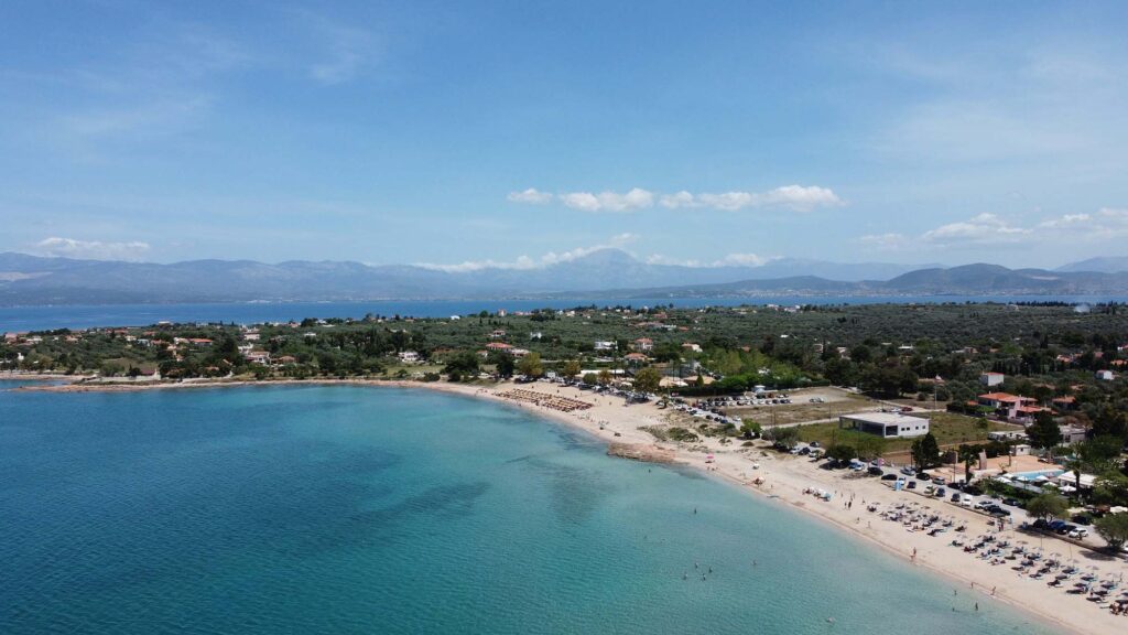 Adventurers discovering natural wonders and caves in Greece.