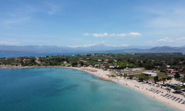 Adventurers discovering natural wonders and caves in Greece.