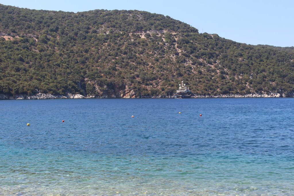 Adventurers discovering natural wonders and caves in Greece.