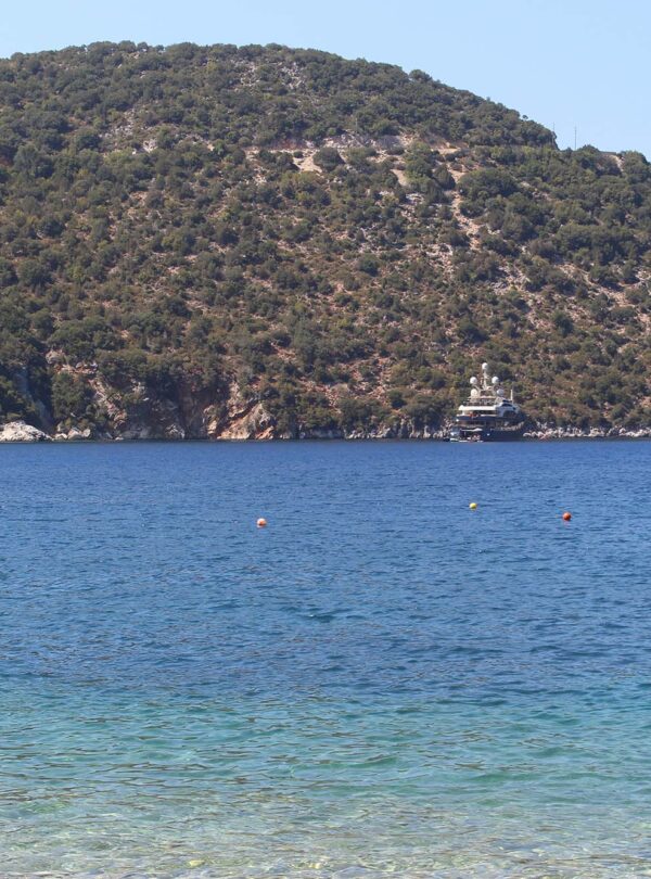 Adventurers discovering natural wonders and caves in Greece.