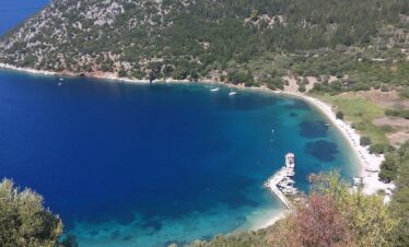 Adventurers discovering natural wonders and caves in Greece.