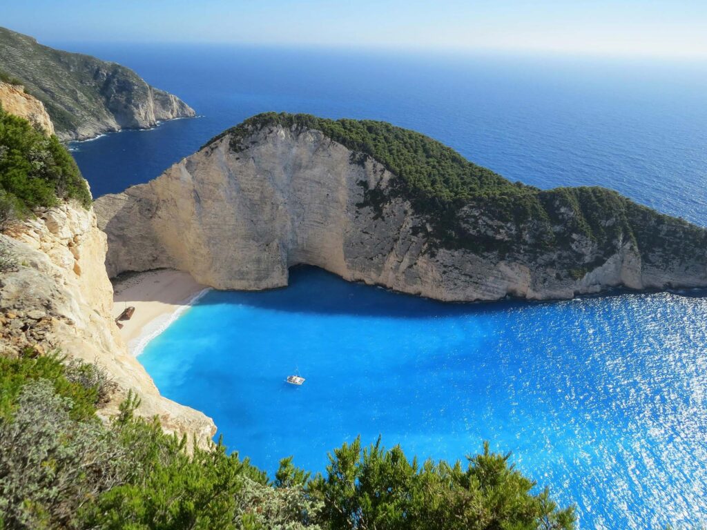 Adventurers discovering natural wonders and caves in Greece.