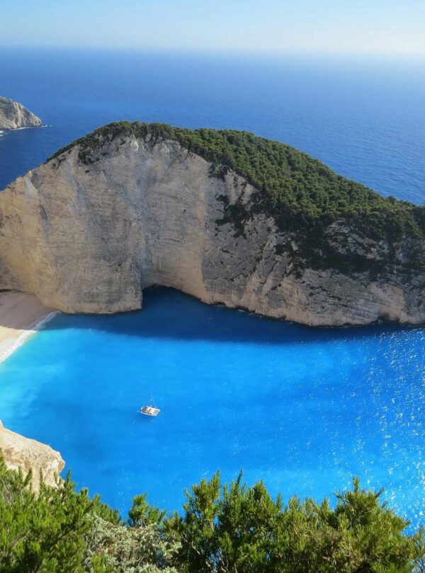 Adventurers discovering natural wonders and caves in Greece.