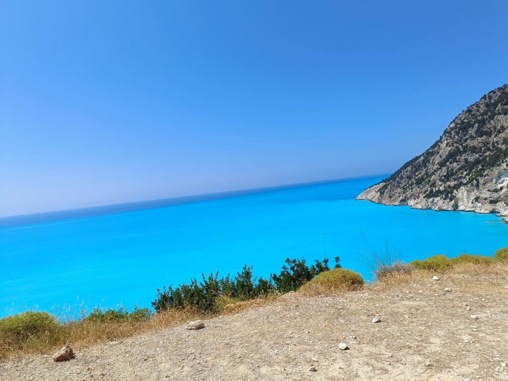 Adventurers discovering natural wonders and caves in Greece.
