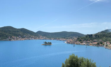 Adventurers discovering natural wonders and caves in Greece.