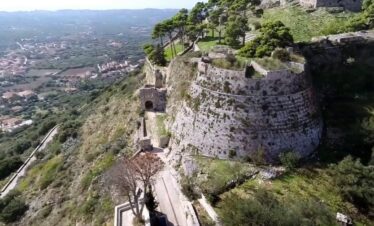 Adventurers discovering natural wonders and caves in Greece.