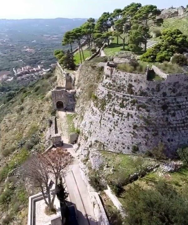 Adventurers discovering natural wonders and caves in Greece.