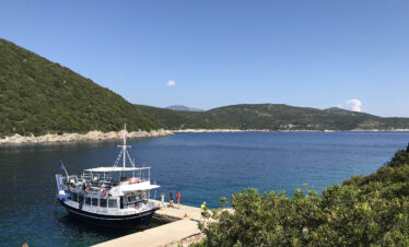 Adventurers discovering natural wonders and caves in Greece.